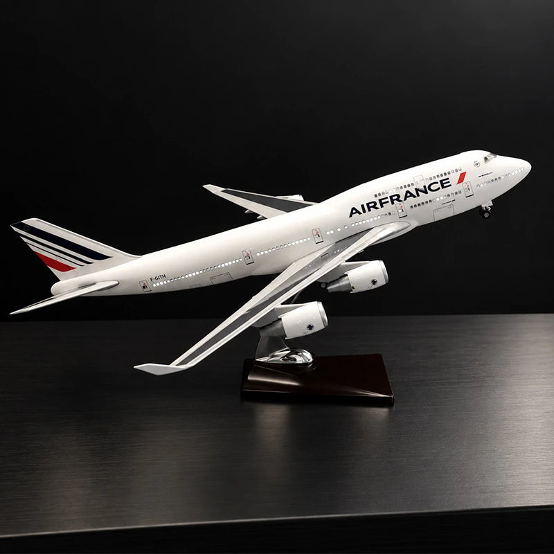 Air France Boeing 747 1:150 scale aircraft display model with openable cabin interior and display stand.