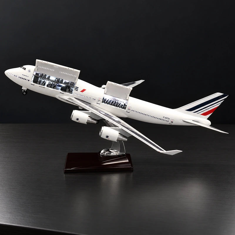 Air France Boeing 747 1:150 scale aircraft display model with openable cabin interior and display stand.