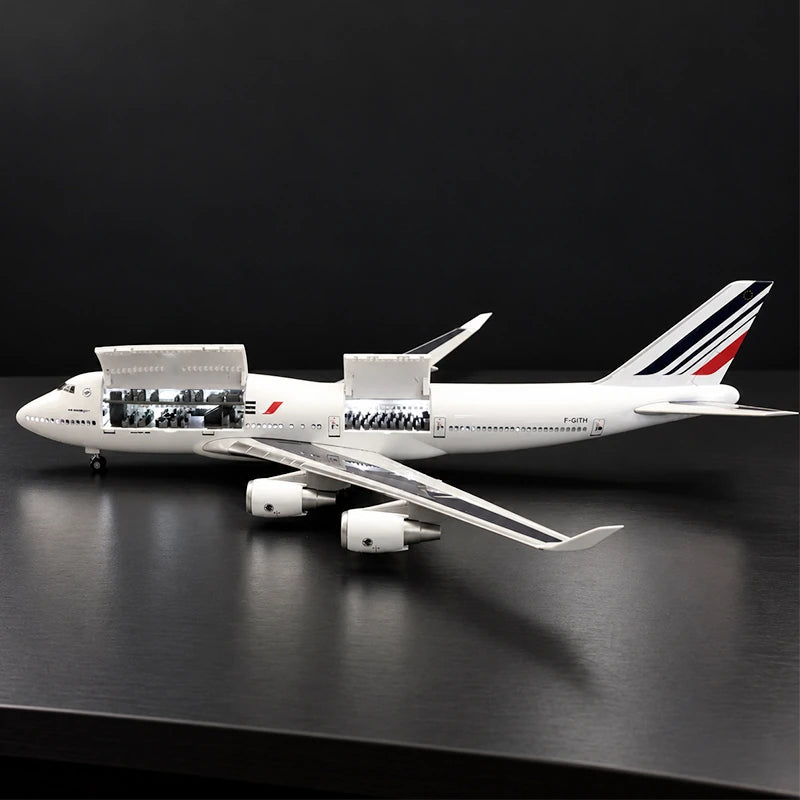 Air France Boeing 747 1:150 scale aircraft display model with openable cabin interior and display stand.