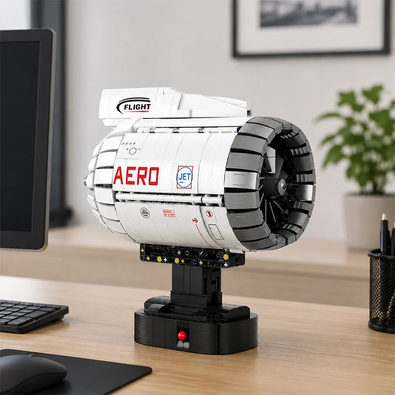 Motorized aircraft turbofan engine building kit displayed on a desk